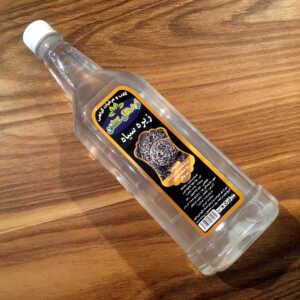 عرق زیره سیاه طبیعی و سنتی کاشان ژیوار، تقویت‌کننده گوارش و ضد نفخ، در بطری یک لیتری