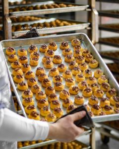 کارگاه حاج نصرالله نوری تولید کننده بهترین شیرینی‌های سنتی کرمانشاه