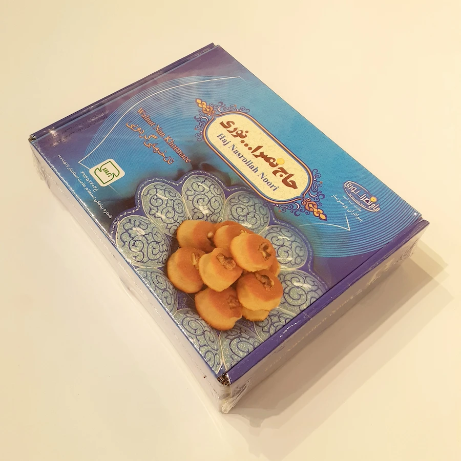 خرید نان خرمایی تازه و سنتی کرمانشاهی در تهران با مغز خرما و تزیین کنجد