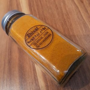 پودر زردچوبه اصل هندی ژیوار در شیشه شفاف بهداشتی با رنگ نارنجی طبیعی